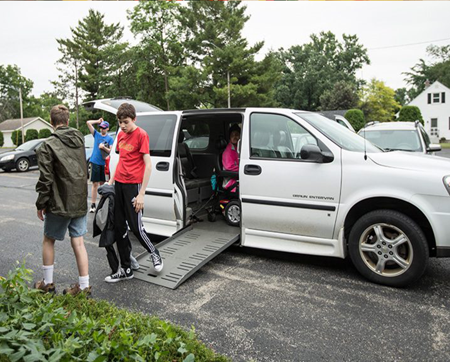Covey clients getting out of the minivan.