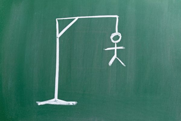 Hangman written on a chalk board.
