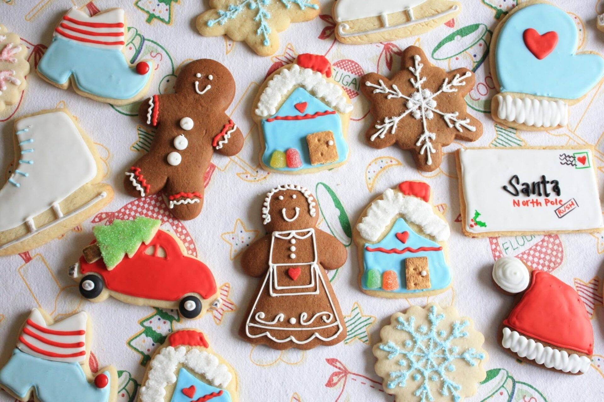 A table of decorated Christmas cookies.