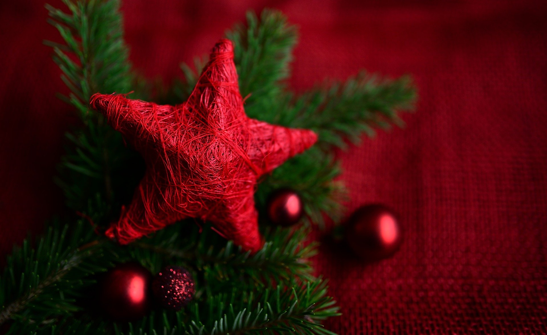 A red, woven, holiday star.