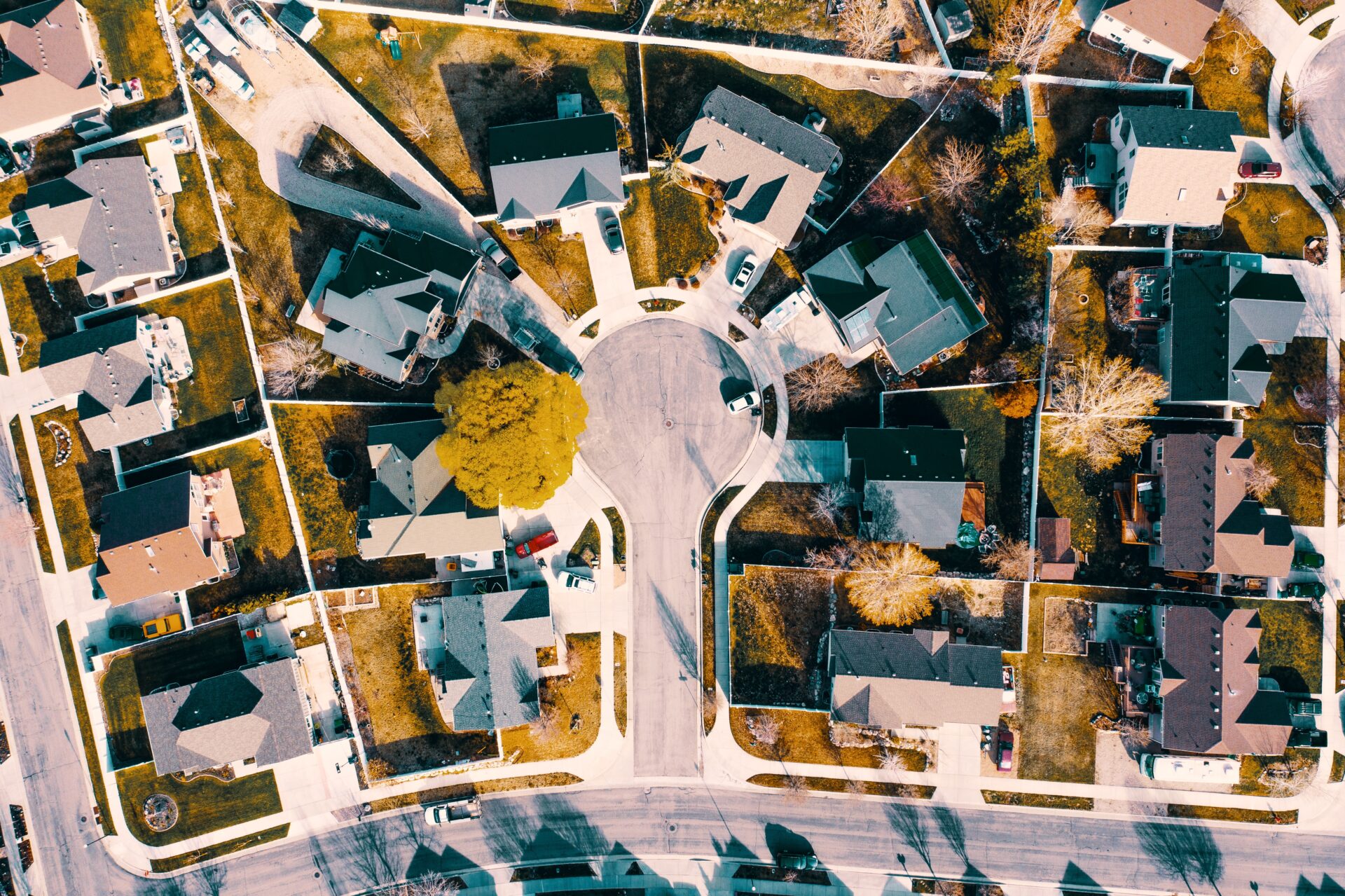 An overhead shot of houses in a neighborhood.